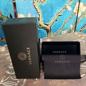 Versace black, sunglass case with gold lettering, black box and lens cloth.